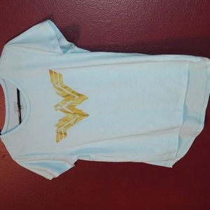 Aqua blue top with gold emblem